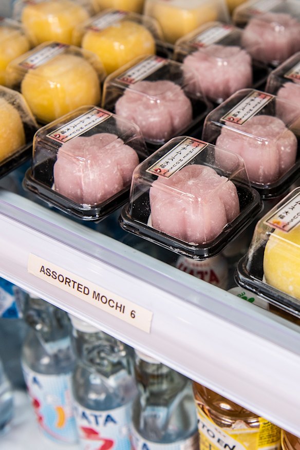 Fridge shelves filled with sweets.