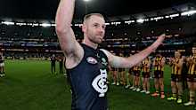 Sam Docherty of Carlton receives a guard of honour in his last game.