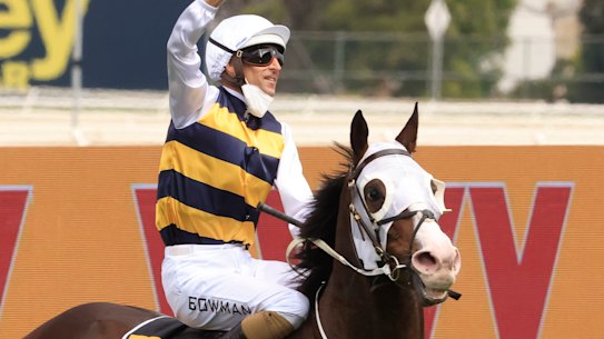 Hugh Bowman salutes the crowd after winning Saturday’s Golden Eagle but should be it move back a week