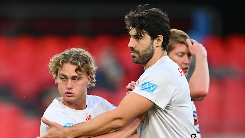 AFL LIVE: Suns, Lions fire up for sold out Q Clash; Dockers pile 19 goals in a row to obliterate the miserable Roos