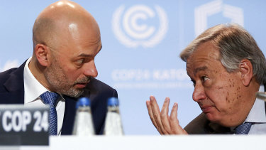 No cop out: UN Secretary-General Antonio Guterres, right, talks to UN climate conference president, Poland's Deputy Environment Minister Michal Kurtyka, after flying back to the event to urge more effort from the negotiators.