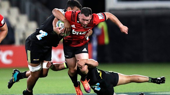 Back in action: Crusaders star Ryan Crotty runs the ball for the Christchurch club.