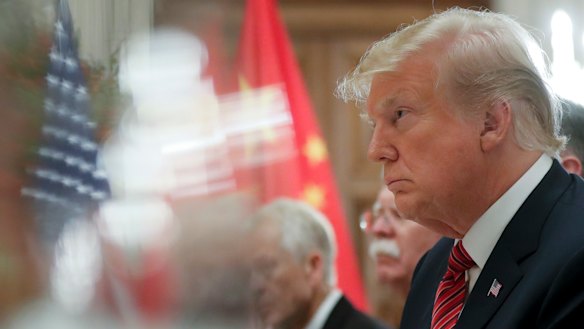 US President Donald Trump listens to China's President Xi Jinping during their bilateral meeting at the G20 Summit, on Saturday in Buenos Aires, Argentina. 