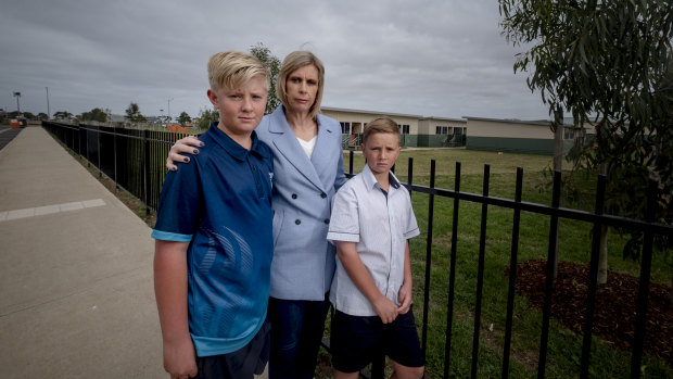 Point Cook's Sam Gercovich with sons Tom, 13, and Ollie, 11 in front of the yet-to-be-completed Saltwater P-9 College in Point Cook. 