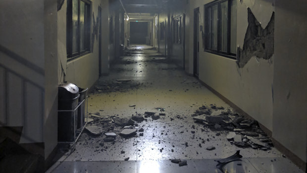 Debris is scattered on the floor of a damaged building in Digos, Davao del Sur province, southern Philippines, after an earthquake on October 16.