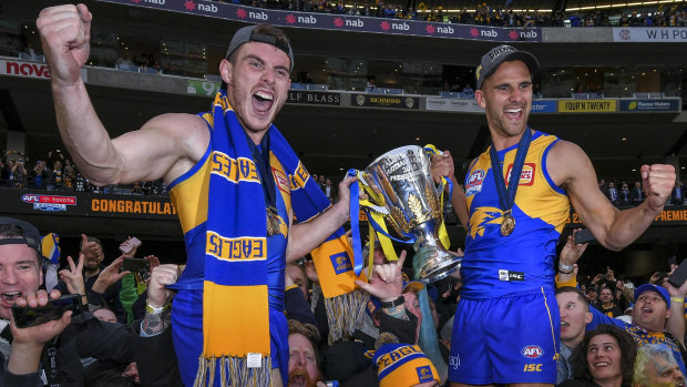 Luke Shuey (left) and Dom Sheed with the premiership cup.
