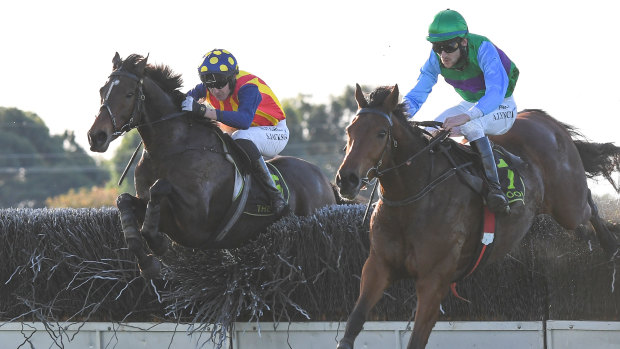 Shane Jackson rides Ablaze (left) to victory from Zed Em in Tuesday's Grand Annual Steeple at Warrnambool.
