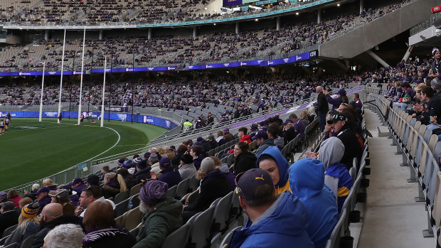 Spectators seated in every second row to observe social distancing policies during the Fremantle and West Coast derby on Sunday.