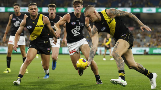 Richmond superstar Dustin Martin gathers one of 31 possessions on Thursday night against Carlton. 