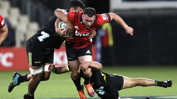 Back in action: Crusaders star Ryan Crotty runs the ball for the Christchurch club.