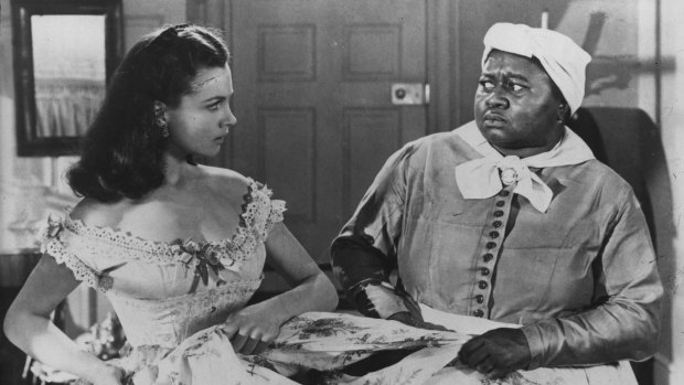 Scarlett O'Hara (Vivien Leigh), left, and Mammy (Hattie McDaniel) in <i>Gone With The Wind</i>.