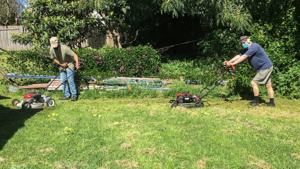 Geoff Boer and "Tom", two of the masked mowers of Cape Paterson