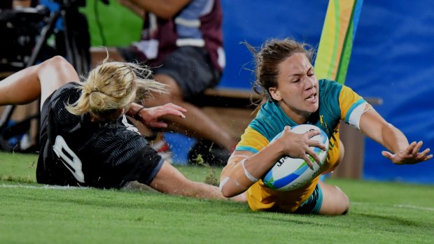 Unforgettable: Evania Pelite scores for Australia to plunge a dagger into Kiwi hearts in the Rio final.a try.