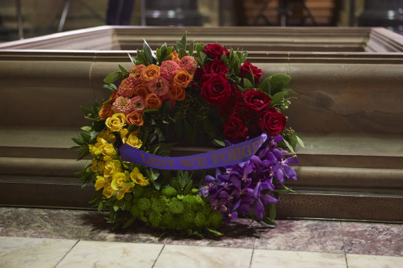 A rainbow wreath laid by representatives of DEFGLIS, which represents queer ADF employees, at the Shrine on Anzac Day 2022.