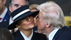 Donald Trump tries and fails to kiss his wife at the inauguration.
