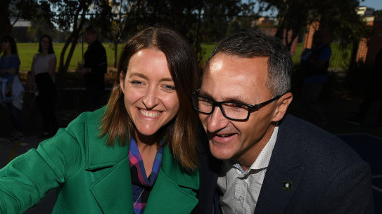 Greens candidate for Macnamara Steph Hodgins-May takes a selfie with party leader Richard Di Natale on Saturday.