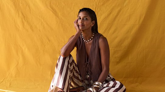 Zara waistcoat, $70. Elka Collective “Lumi” pants, $269. Lucy Folk “Pisces” choker, $750. Dinosaur Designs bangles, from $55 (worn throughout). A.Emery “Jalen” sandals, $220 (worn throughout).