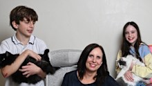 Emma Shannon, in her home office with her children, quit her job and founded her own recruitment company to better manage her career and caring responsibilities.