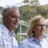 Gerry and Bronwyn Borghesi at the bottom of the hill where a landslide destroyed the home below theirs.