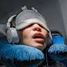 Essentials: Eye mask, noise-cancelling earphones and a neck pillow.