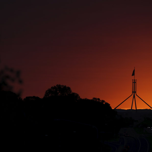 A dramatic sunrise sweeps over Canberra ahead of a dramatic day in national politics. 