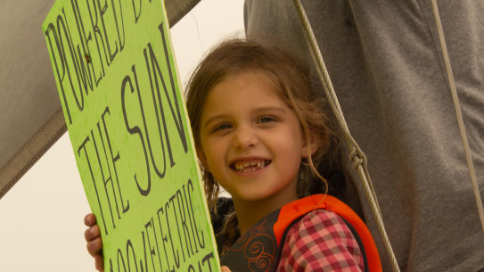 Lila Hart, 6, on the solar-powered boat in New York Harbour.