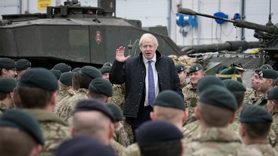 Prime Minister Boris Johnson addresses British soldiers after serving Christmas lunch to British troops stationed in Estonia last year.