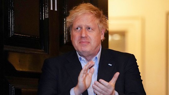 Prime Minister Boris Johnson claps outside 11 Downing Street to salute local heroes during last week's nationwide Clap for Carers NHS initiative. Johnson has been living at No 11 in isolation after being diagnosed with COVID-19.