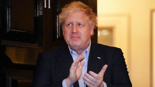 UK Prime Minister Boris Johnson claps for healthcare workers on April 2, days before he was admitted to hospital. 