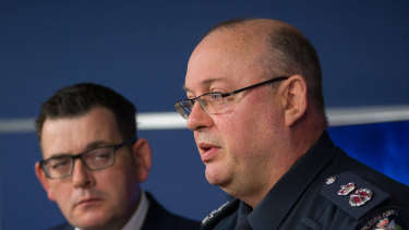 Victoria Police's then-chief commissioner Graham Ashton with Premier Daniel Andrews. 