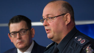 Victoria Police's then-chief commissioner Graham Ashton with Premier Daniel Andrews. 