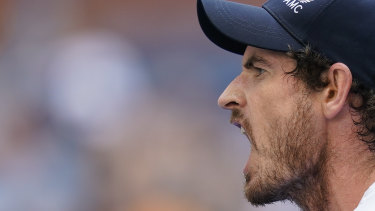 Andy Murray reacts after scoring a point against Stefanos Tsitsipas in their US Open clash.
