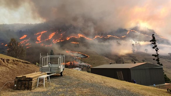 A bushfire burning in the Gold Coast hinterland on Friday.