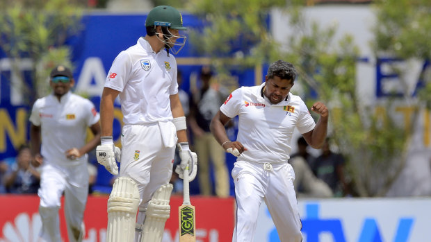 Victory dance: Rangana Herath dismisses South Africa's captain Faf du Plessis.