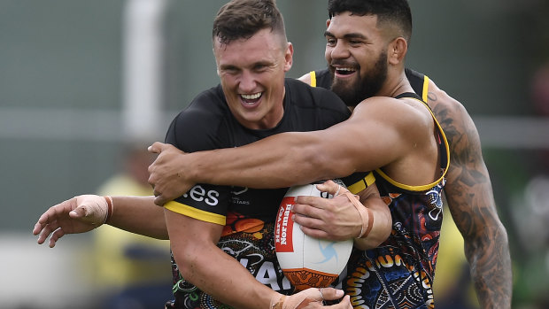 Jack Wighton is tackled by David Fifita at Indigenous All Stars training.