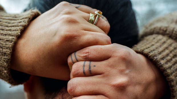 The tattoos on Keegan Richards's fingers, which echo the story of Sassuma Arnaa, an Inuit goddess whose fingers were cut off as a punishment and, upon falling into the water, transformed into sea mammals.