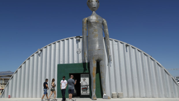 People visit the Alien Research Centre in Hiko, Nevada, near Area 51.