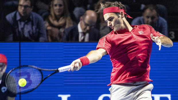 The maestro: Roger Federer of Switzerland returns a ball to Stefanos Tsitsipas of Greece.