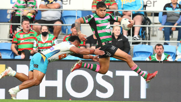 Latrell Mitchell makes a break.