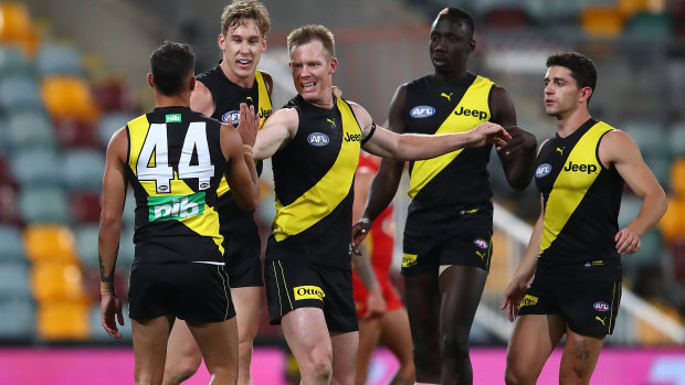 Jack Riewoldt, centre, has defended teammate Tom Lynch, back.