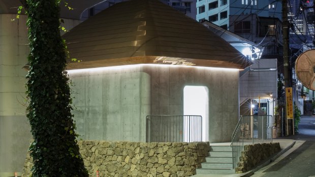 The public toilet that Marc Newson designed is beneath an underpass in Yoyogi Park, Tokyo.