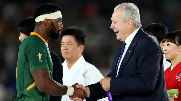 Bill Beaumont, right, won a second term as World Rugby chairman on the promise of delivering the change he failed to deliver in his first term. 