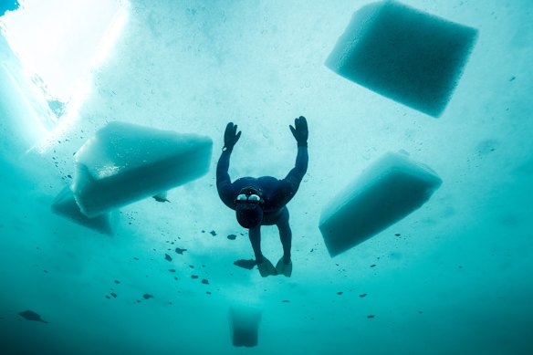 Williams acclimatising to the cold in Norway in 2019 before setting a 70-metre world record under ice.