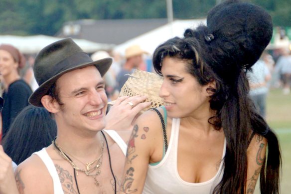 Amy Winehouse with her partner Blake Fielder-Civil at the Isle of Wight Festival in 2007.
