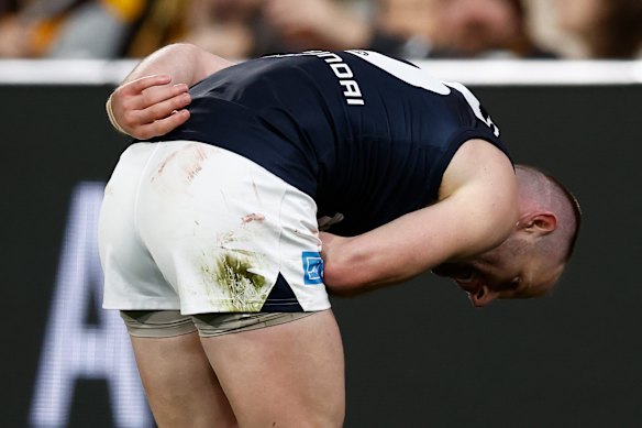 Sam Docherty of the Blues bows to the crowd after kicking a goal.