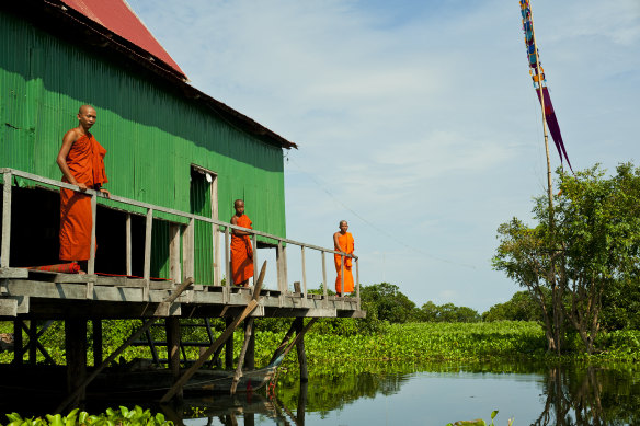 Mekong meander … become absorbed in river life.