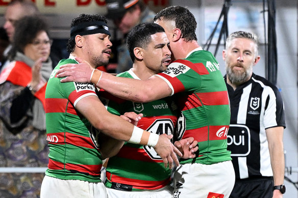 The Rabbitohs celebrate after Jacob Gagai’s try in the first half.