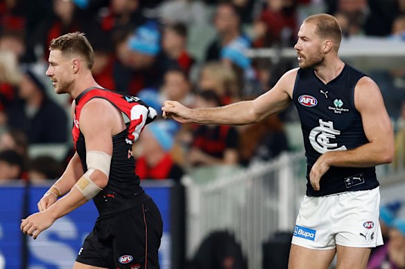 Tight leash: Harry McKay holds on to brother Ben McKay.