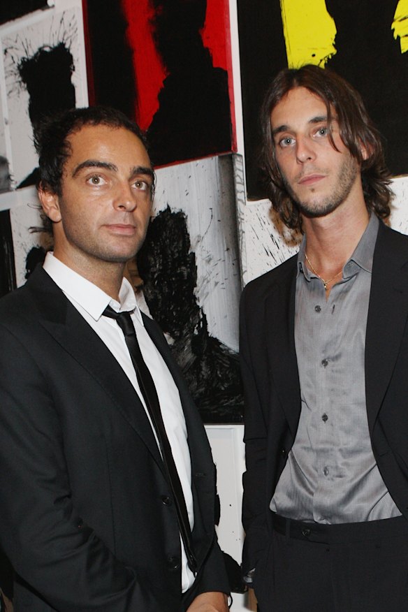 Andy Valmorbida and Vladimir Roitfeld attend the opening of “Richard Hambleton: A Retrospective” in New York in 2009.