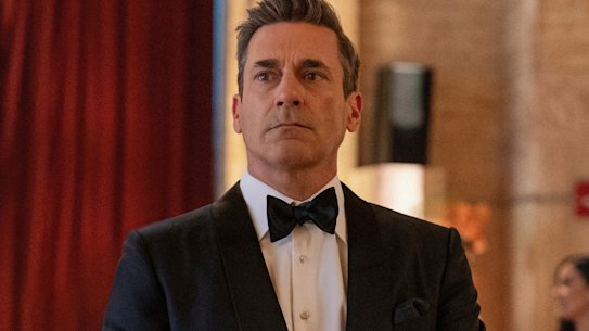 John Hamm plays Andrew Cooper, who starts robbing the rich when he’s fired from his Wall Street job.